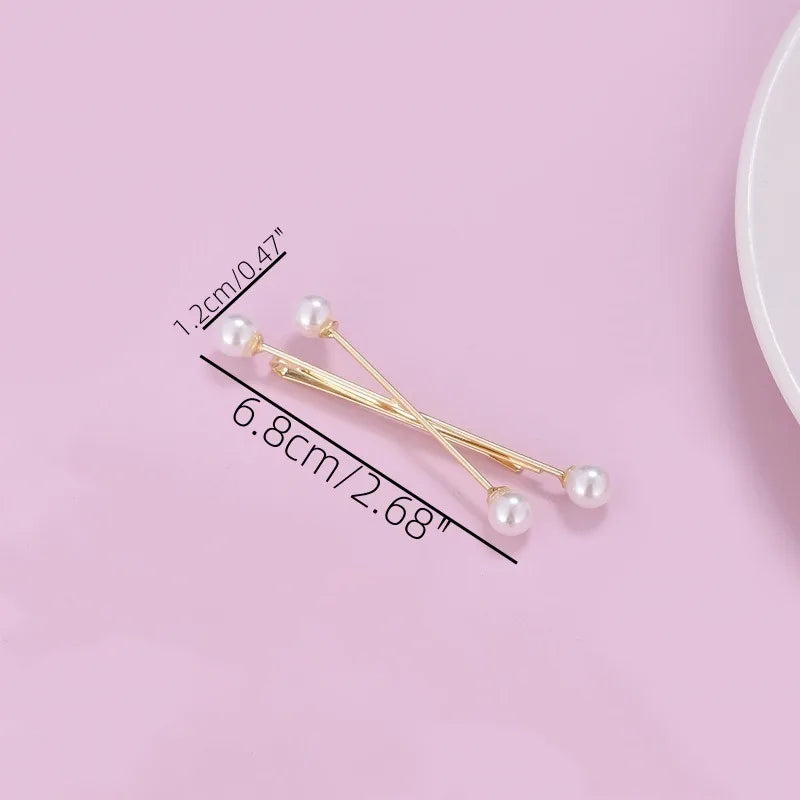 Gold pearl cross hair clips and hair barrettes