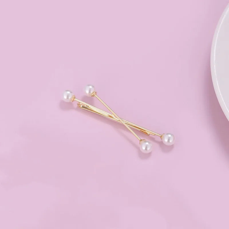 Gold pearl cross hair clips and hair barrettes